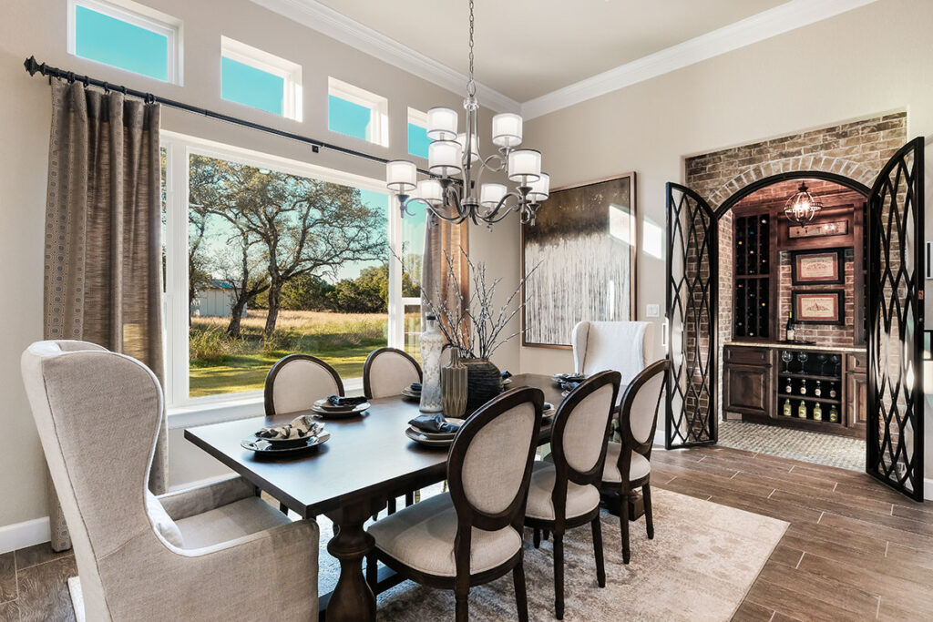 Elegant Wine Grotto With Stone Walls And Tasting Area In A Luxury Home